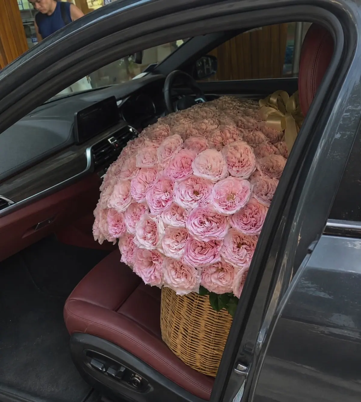 201 garden roses in a basket