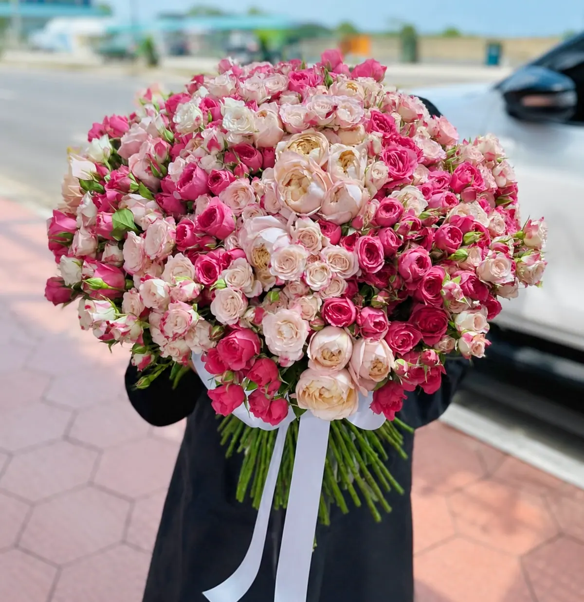 131 spray roses with ribbon