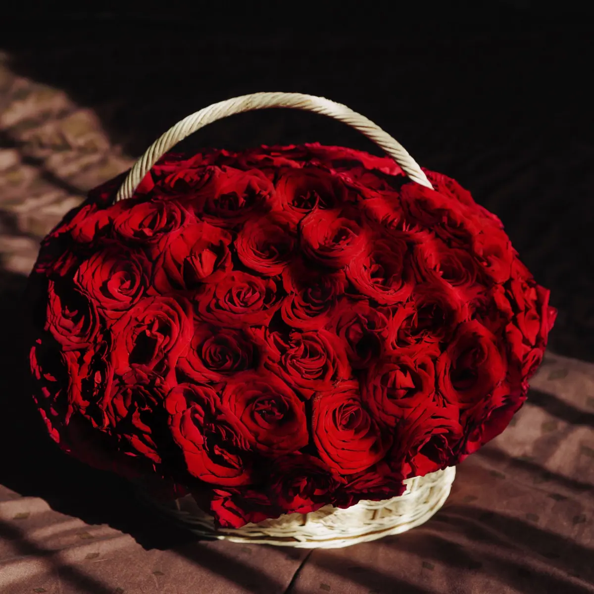 101 red roses in a basket